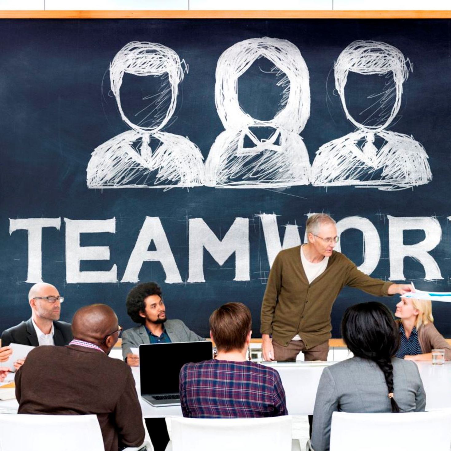 34404399 – group of diverse people listening to the speaker